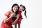 Asian Chinese daughter and mother smile and hug together