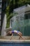 Asian Chinese female Yogi practising by the swimming pool