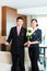 Asian Chinese hotel manager welcoming VIP guests