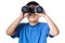 Asian Chinese little boy holding binoculars in isolated background