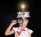 Asian chinese little girl holding magnifier with virtual reality