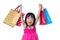 Asian Chinese little girl holding shopping bags