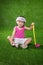 Asian Chinese little girl playing golf