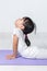 Asian Chinese little girl practicing yoga pose