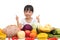 Asian Chinese little girl thumbs up with fruit and vegetable