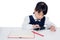 Asian Chinese little girl in uniform studying with tablet computer
