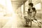 Asian Chinese mother and daughters waiting for a bus