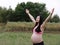 Asian Chinese pregnant woman in yoga dress embrace hug nature have fresh air enjoy peaceful life relax meditation in forest garden