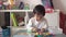 Asian Chinese Toddler playing and learning with colorful alphabets