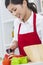 Asian Chinese Woman Preparing Vegetables Salad Food in Kitchen