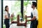 Asian coffee shop owners couple cleaning and setting tables After the customer returned to prepare for receiving customers. Clap