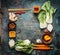 Asian cooking ingredients and spices with chopsticks on rustic background , top view , place for text, frame. Asian food and eatin