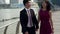 Asian couple in business attire slow motion