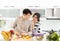 Asian Couple cooking in the kitchen