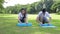 Asian couple exercising together in the park in the morning Both are happy.