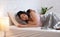 Asian couple lesbian sleeping in morning at bed in cozy home