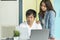 Asian couple looking at issues notification from bank about late payment home loan credit