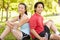 Asian couple resting after exercise