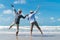 Asian couple senior elder retire resting relax at sunset beach