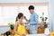 Asian couple spending free time together on vacation Cook with your partner while you\\\'re pregnant. A man defends