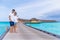 Asian couple sweetheart honeymoon traveling sea background.