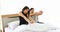 Asian couples lover waking up in her bed fully rested in morning