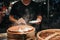 Asian Culture Street food booth selling Chinese specialty Steamed Dumplings preparation cooking in a bamboo basket at restaurant C