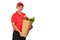 Asian delivery man in red uniform carry grocery bag in hands isolated on white background