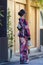 Asian Destinations. Full Length  Portrait of Young Female Geisha in Traditional Japanese Kimono in Kyoto City,  Japan