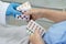 Asian doctor holding antibiotics capsule pills in blister