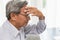 Asian elder headache pain suffer from stress