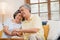 Asian elderly couple holding their hands while taking together in living room, couple feeling happy share and support each other