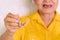 Asian Elderly woman over 70 years old be smile with a few broken teeth and holding dentures in hand. Dentures for prosthetic devic