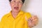 Asian Elderly woman over 70 years old be smile with a few broken teeth and holding dentures in hand. Dentures for prosthetic devic