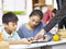 Asian elementary schoolchildren using digital tablet