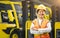 Asian engineer or technician with forklift trucks