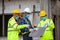 Asian engineer technician team introduction of workers to build a house in the construction site