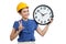 Asian engineer woman show victory sign with a clock