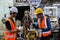 Asian engineering team worker wearing uniform safety and hardhat working machine lathe metal in factory industrial, worker