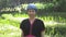 Asian ethic woman with native dress smile at her organic rice field