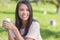 Asian Eurasian Girl Woman Drinking Coffee or Tea