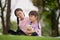 Asian family children elder sister comforts her younger sister