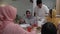 asian family and grandparents having iftar on ramadan