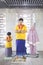 Asian family praying together in the mosque