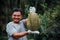 Asian farmer holding Durian is a king of fruit