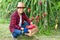 Asian farmers with the dragon fruit in the garden