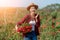 Asian Farmers woman holding the rose bush in Rose Garden