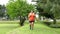 Asian fat woman smiling happy running outdoor exercise to lose weight