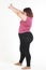 Asian fat woman Wear exercise clothes, stretch your arms, stand on a white background.