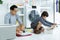 Asian father and kid little boy spends time together in the laundry room. Single father and his son sitting the floor helping of